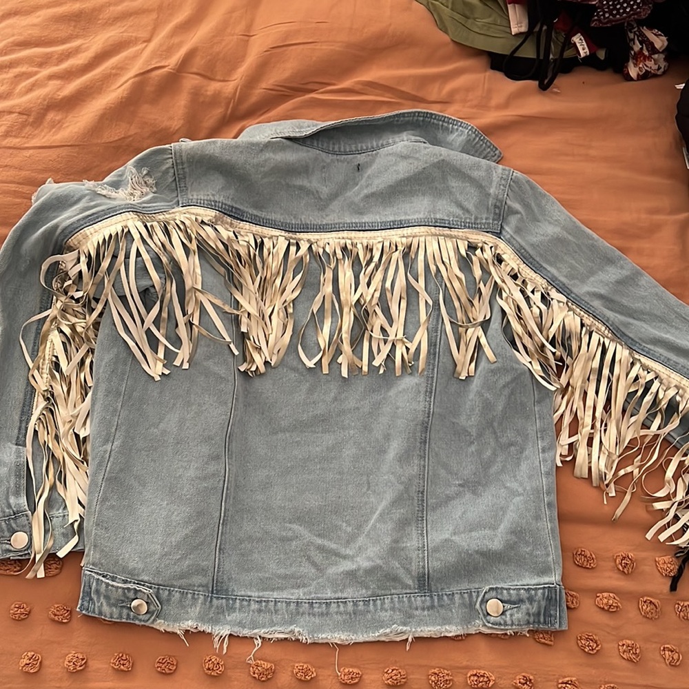 Denim jacket with fringe